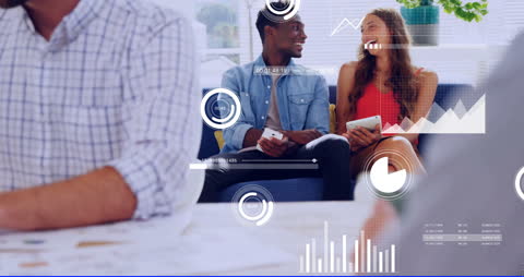 Diverse Colleagues Discussing Ideas with Business Data Graphics