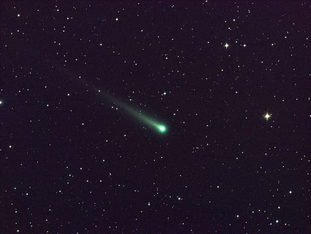 Comet ISON captured in this spectacular view was taken with a color CCD camera attached to a 14-inch telescope. This image shows ISON's glowing core and trailing tail against a backdrop of stars. Ideal for educational materials on comets, space exploration, and astronomy enthusiasts’ presentations. Useful for infographics or articles related to comet studies and celestial phenomena.