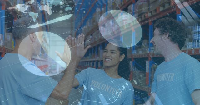 Three Volunteers Celebrating Success in Warehouse with High Five - Download Free Stock Images Pikwizard.com