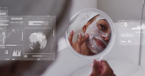 Woman Applying Facial Cream with Futuristic Graph Overlay