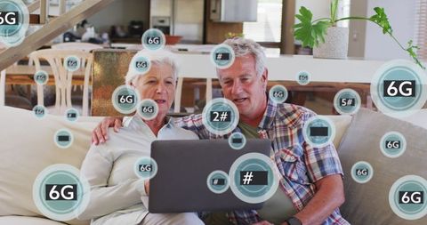 Senior Couple Using Laptop Surrounded by Digital 6G Icons
