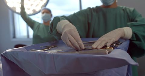 Surgeon Preparing Instruments in Operating Room for Surgery - Download Free Stock Images Pikwizard.com