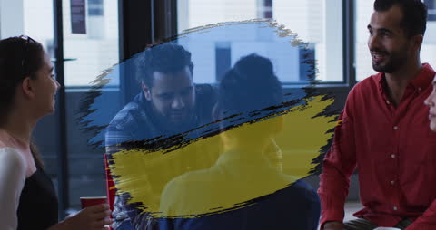 Diverse Business Team Collaborating with Ukraine Flag Overlay