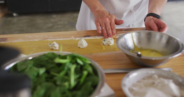 Chef Preparing Fresh Ravioli with Spinach and Cheese Filling - Download Free Stock Images Pikwizard.com