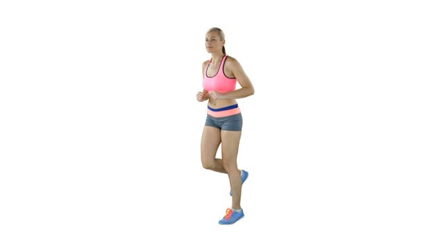 A young Caucasian woman is jogging in place, dressed in athletic wear, with copy space - Download Free Stock Photos Pikwizard.com