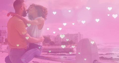 Romantic Couple Embracing at Scenic Beach with Heart Icons