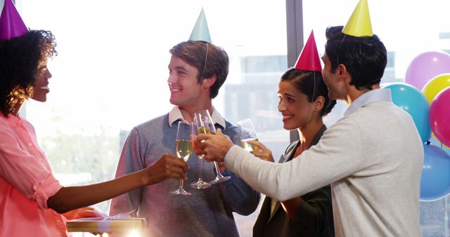 Team Celebrating Office Birthday Party with Hats and Drinks - Download Free Stock Images Pikwizard.com