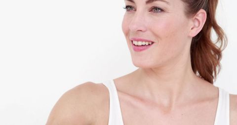 Young Caucasian Woman Smiling In Casual Attire With Copy Space