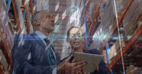 Professionals Analyzing Data in Warehouse Environment