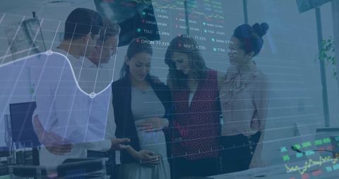 Diverse team analyzing financial data with pregnant colleague in office