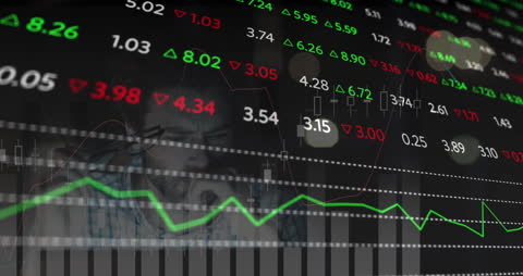 Stock Market Analytics with Blurred Businessman in Background