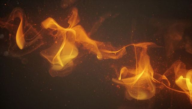 Dynamic swirling flames and smoke on charcoal background
