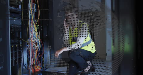 Technician Managing Data Center with Digital Interface Overlay