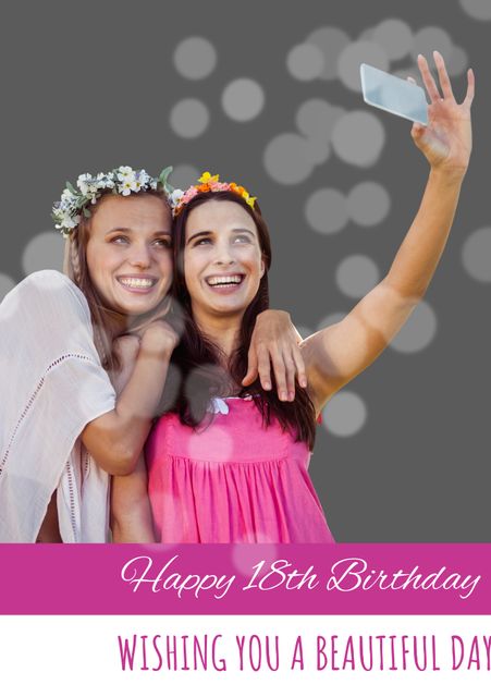 This happy photo captures two young women celebrating an 18th birthday by taking a selfie. Both wear floral headbands, smiling, and embracing, radiating friendship and joy. Ideal for birthday cards, social media posts, and youth-themed advertising.