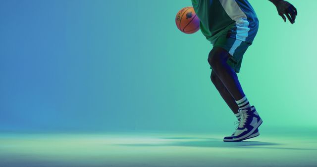 Athlete Dribbling Basketball On Colorful Background - Download Free Stock Images Pikwizard.com