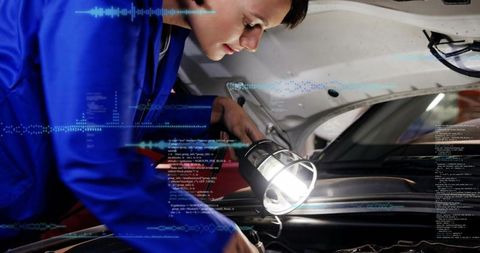 Female Mechanic Inspecting Car Engine with Work Light and Digital Diagnostics Overlay