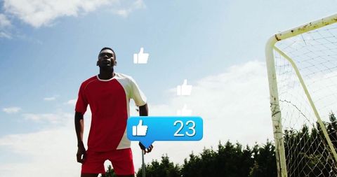 Soccer Player Checking Smartphone near Goalpost with Social Media Likes