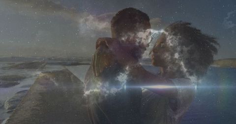 Embracing couple on coastal jetty at dusk with nebula double exposure