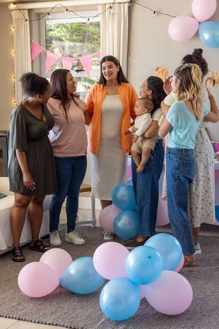 Diverse Friends Celebrating Baby Shower Together
