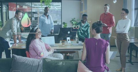 Diverse Team Discussing Eco-Friendly Concepts in Modern Office - Download Free Stock Images Pikwizard.com