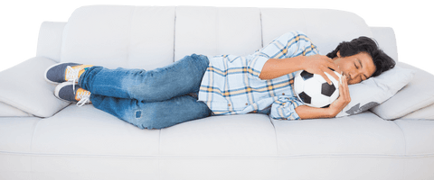 Football Fan Sleeping Comfortably on Sofa with Soccer Ball Transparent - Download Free Stock Videos Pikwizard.com