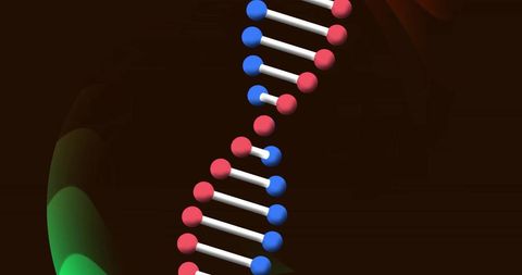 Glowing light trails over spinning dna strand on dark background