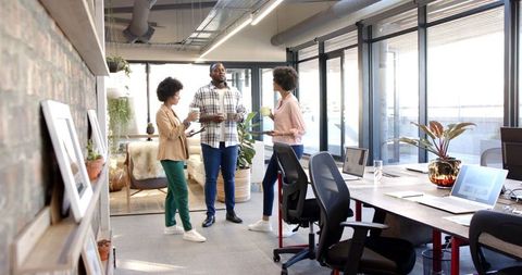 Diverse Team Collaboration in a Modern Open Office