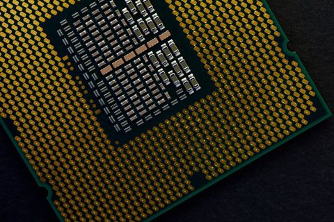 Close-Up of Computer Microprocessor on Dark Surface