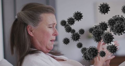 Concerned woman facing virus threatening health alert message