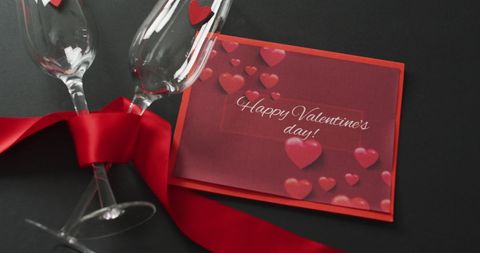 Valentine's Day Celebration with Hearts, Champagne and Red Ribbon - Download Free Stock Images Pikwizard.com