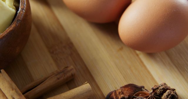 Baking Ingredients Display Including Eggs and Spices on Wooden Board - Download Free Stock Images Pikwizard.com