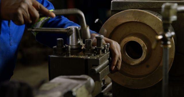 Worker Operating Lathe Machine in Industrial Workshop - Download Free Stock Images Pikwizard.com