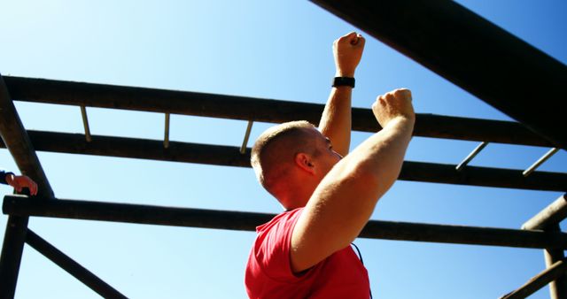 Fit Man Training on Outdoor Monkey Bars During Workout - Download Free Stock Images Pikwizard.com