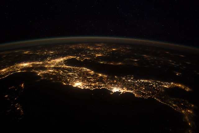 ISS030-E-074783 (25 Jan. 2012 ) --- This nighttime panorama of much of Europe was photographed by one of the Expedition 30 crew members aboard the International Space Station flying approximately 240 miles above the Tyrrhenian Sea on Jan. 25,  2012. Most of the country of Italy is visible running horizontally across the center of the frame, with the night lights of Rome and Naples being visible to the left and right of center, respectively.  Sardinia, and Corsica  are in the lower left quadrant of the photo. The Adriatic Sea is on the other side of Italy, and beyond it to the east and north can be seen parts of several other European nations.