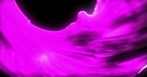 Neon Purple Light Trails in Dynamic Motion over Black Background