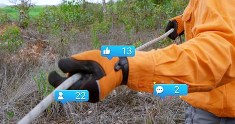 Lumberjack Working Outdoors with Digital Social Media Interaction Icons