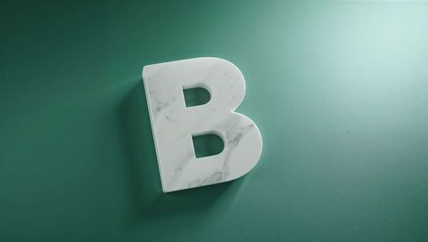 White marble 3d letter b on teal background with soft shadows