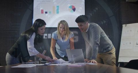 Professionals Analyzing Data in Modern Business Environment