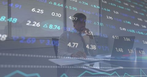 Businessman Analyzing Stock Market Data in Office with Laptop