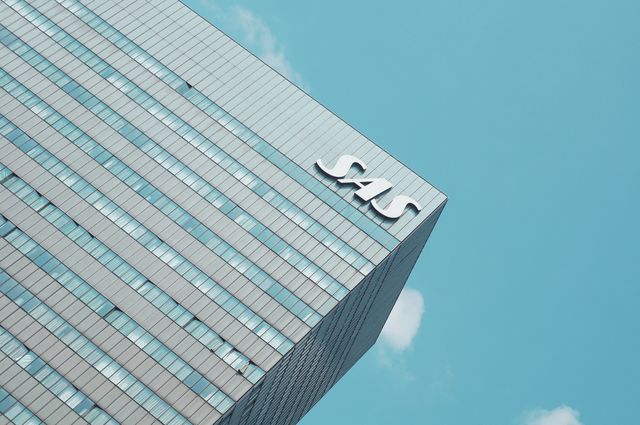 Modern Corporate Office Building with Blue Sky Background - Download Free Stock Images Pikwizard.com