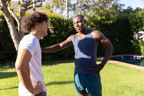 Diverse Male Friends Relaxing After Outdoor Workout