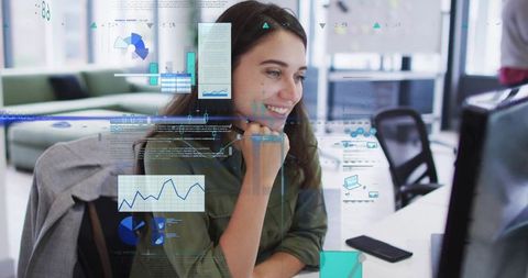 Professional Woman Analyzing Data on Computer at Modern Office