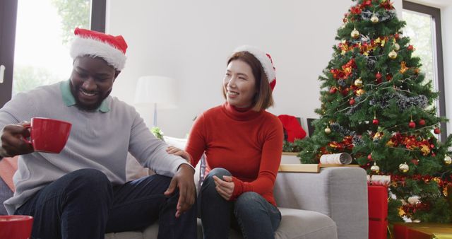 Diverse Couple Celebrating Christmas at Home with Tree and Gifts - Download Free Stock Images Pikwizard.com