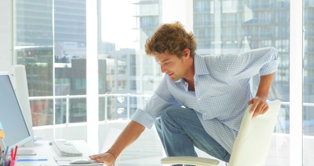 Young Professional Working at Bright Modern Office Desk - Download Free Stock Images Pikwizard.com