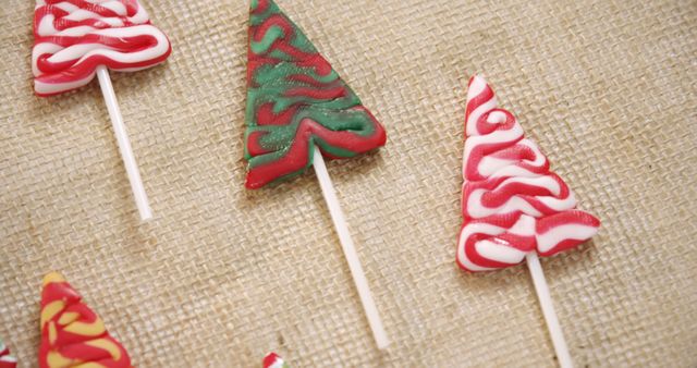 Festive Christmas Tree-Lollipops on Burlap - Download Free Stock Images Pikwizard.com