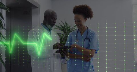 Diverse Medical Professionals Discussing with Heart Rate Monitor Overlay - Download Free Stock Images Pikwizard.com
