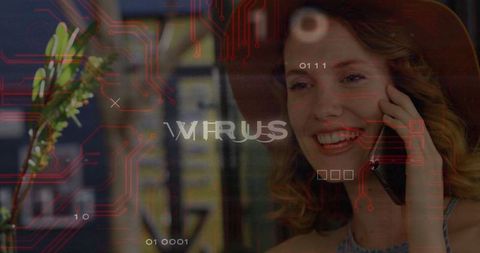 Laughing woman on phone with digital virus overlay