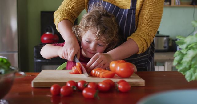 Mother and Son Enjoy Cooking Together in Kitchen - Download Free Stock Images Pikwizard.com