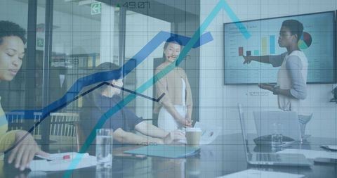 Corporate Team Analyzing Sales with Interactive Charts Overlay