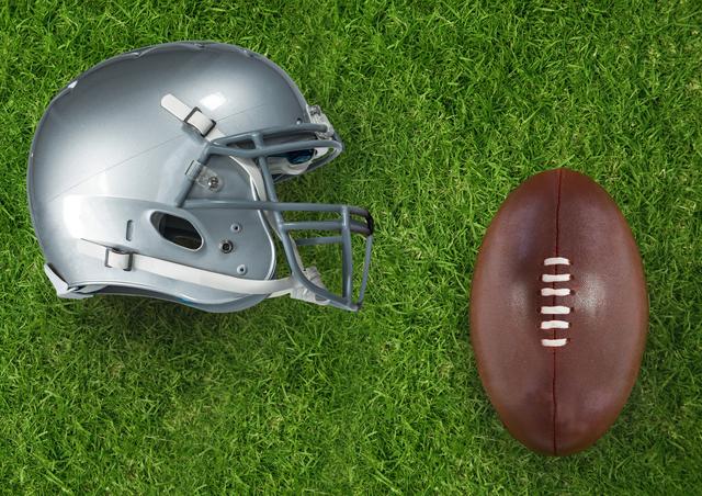 Perfect for illustrating sports themes, football events, or safety in sports. Ideal for use in articles, advertisements, or promotional materials related to football games, training, or sports equipment.